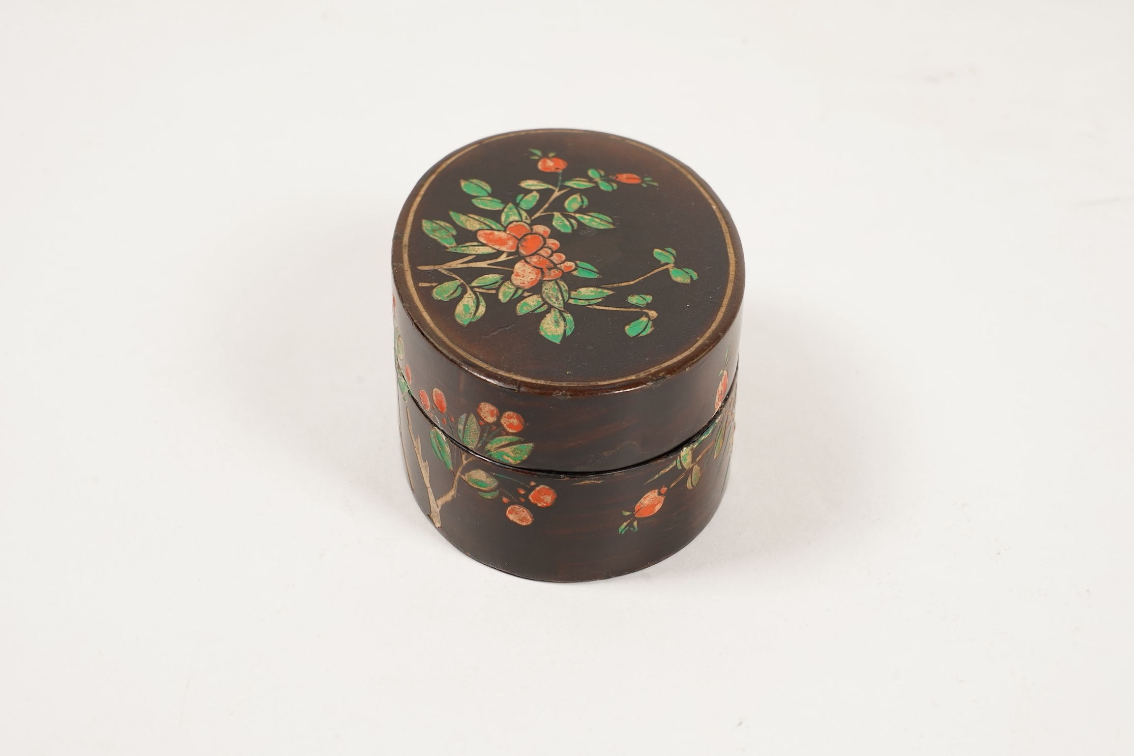 A small Chinese coromandel lacquer oval box, Kangxi period